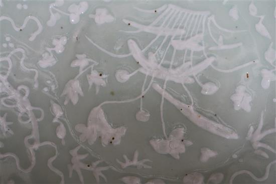 A Chinese white slip decorated celadon dish 35cm.